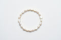 Pulsera asimétrica de perlas falsas