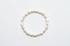 Pulsera asimétrica de perlas falsas
