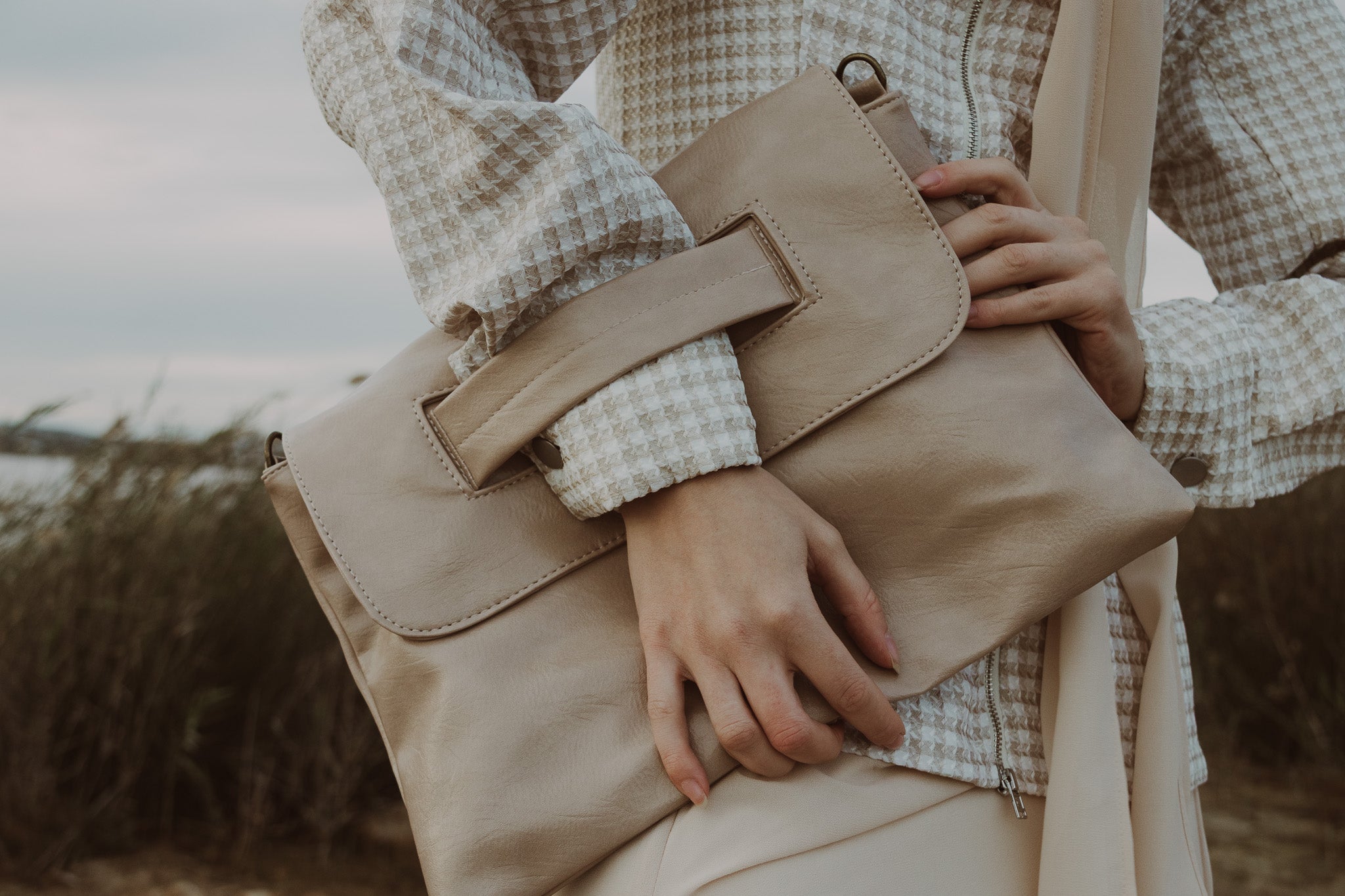 Clutch bag with shoulder strap