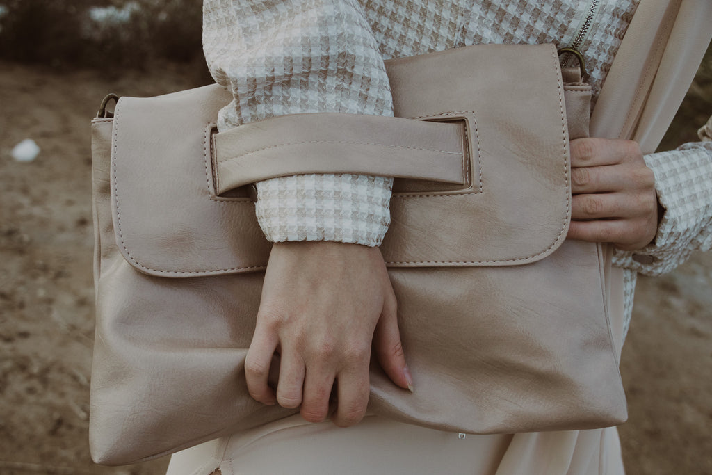 Clutch bag with shoulder strap