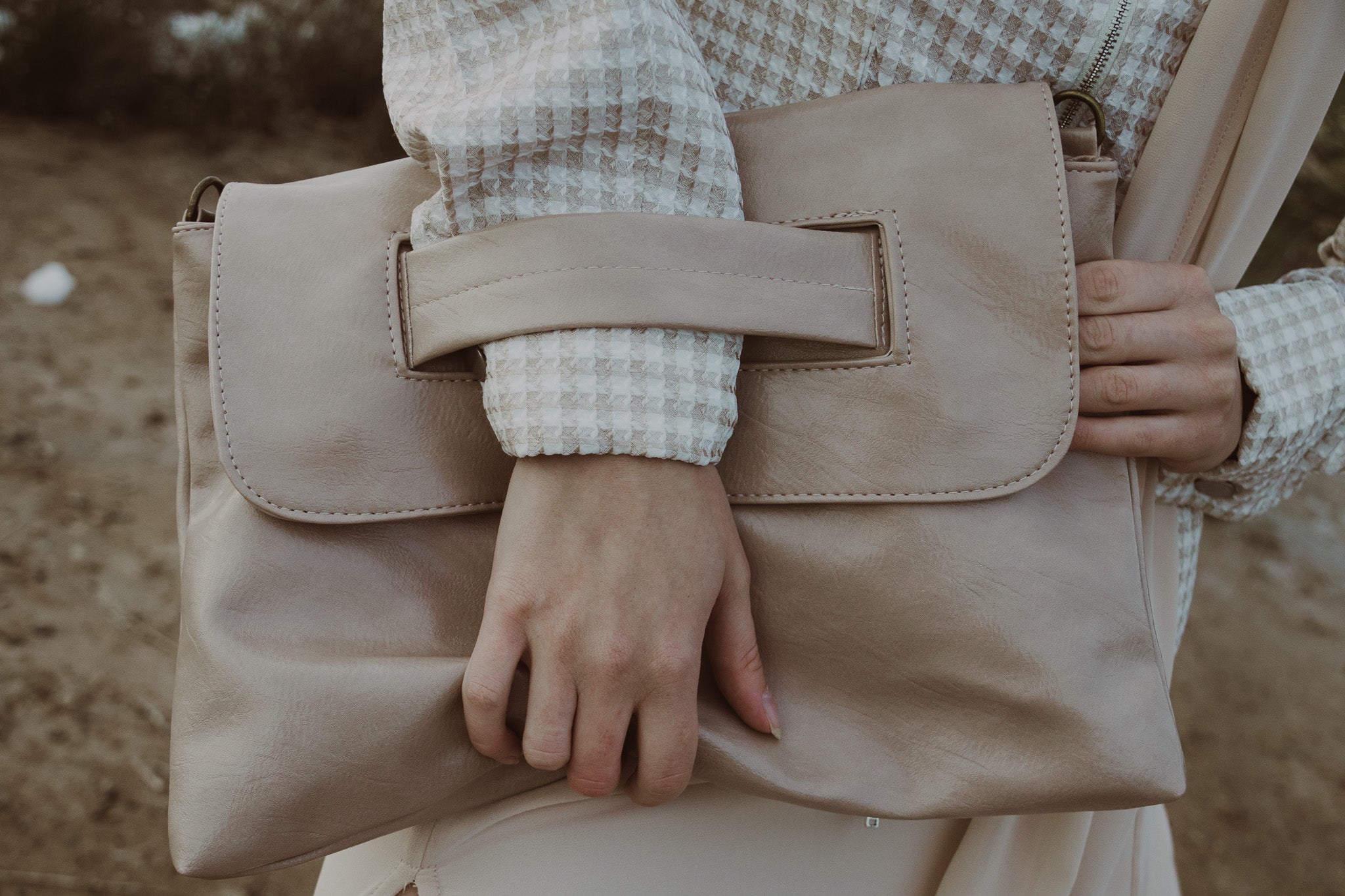 Clutch bag with shoulder strap
