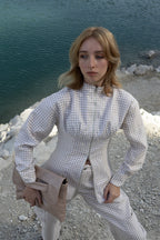 Set of casual plaid tweed jacket and trousers