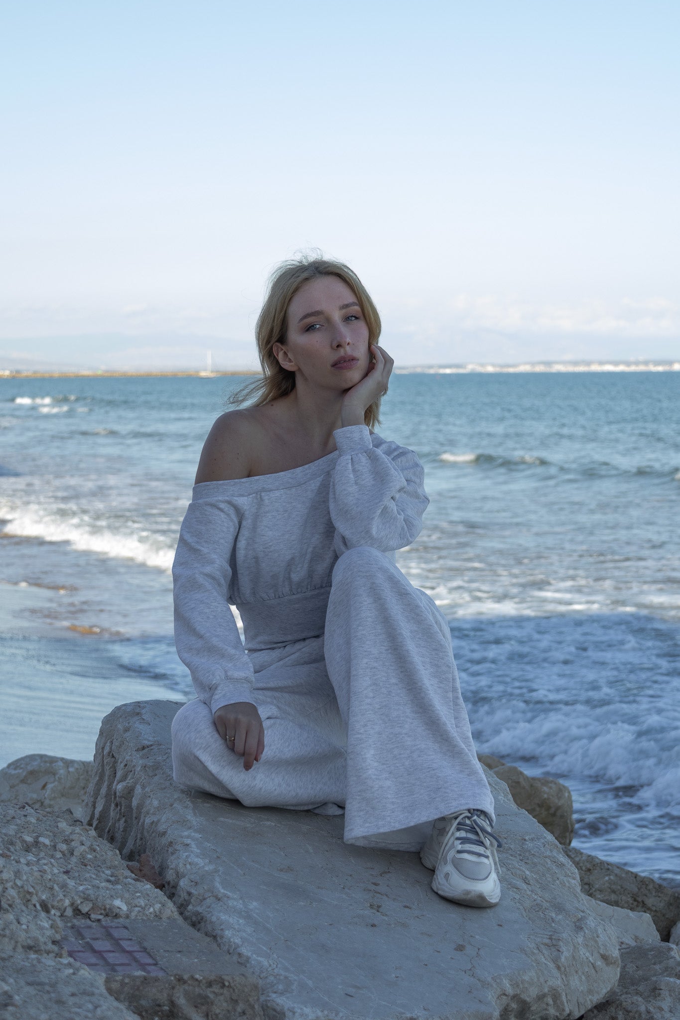 Asymmetrical off-the-shoulder jumpsuit with wide leg
