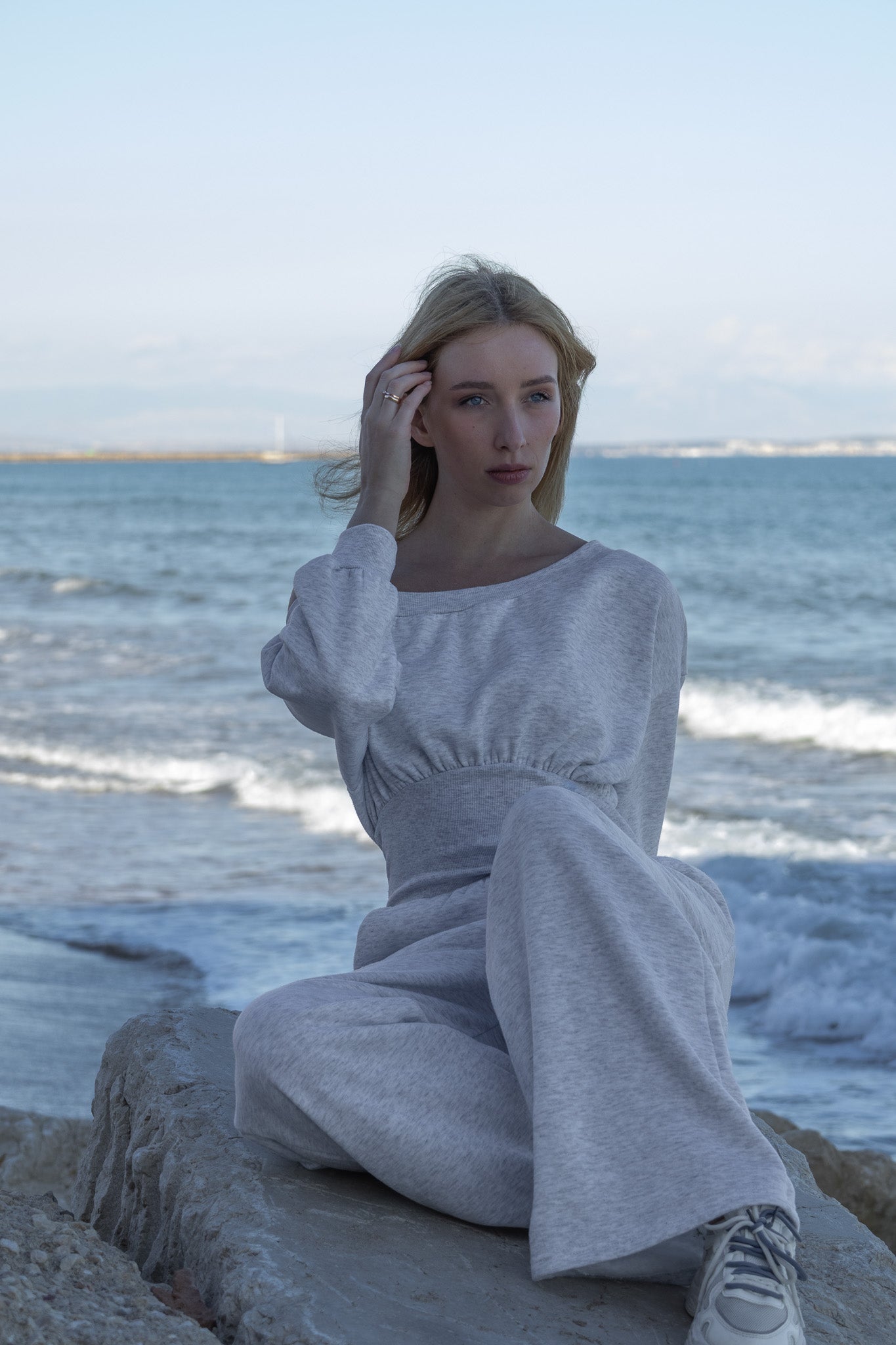 Asymmetrical off-the-shoulder jumpsuit with wide leg