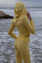 Conjunto de chaqueta con capucha simple y pantalones de yoga ajustados forrados de forro térmico