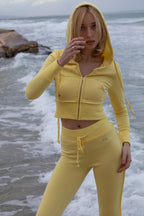 Conjunto de chaqueta con capucha simple y pantalones de yoga ajustados forrados de forro térmico