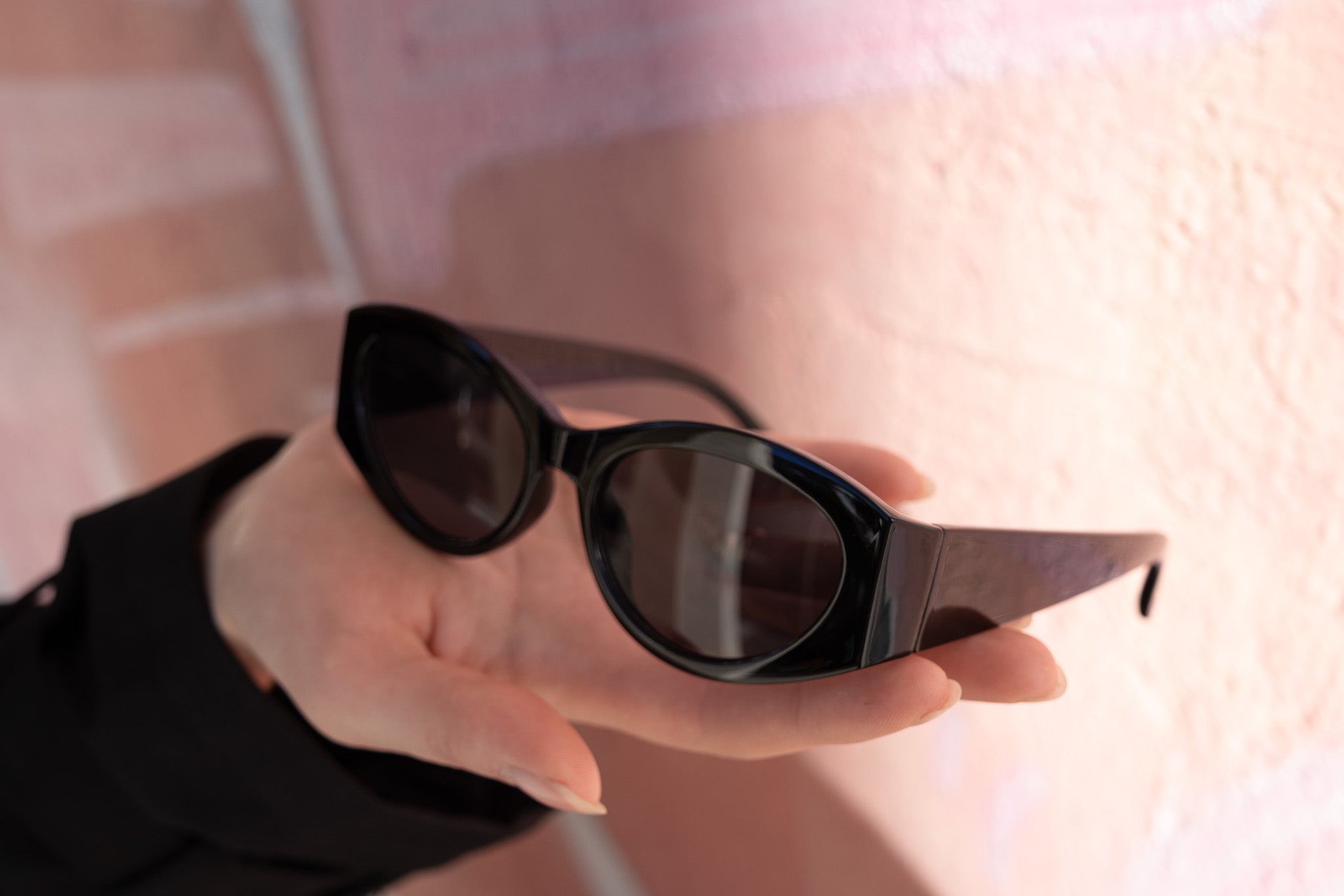 Black cat-eye style sunglasses