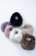 Women's handbag with faux fox fur design