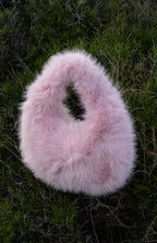 Women's handbag with faux fox fur design