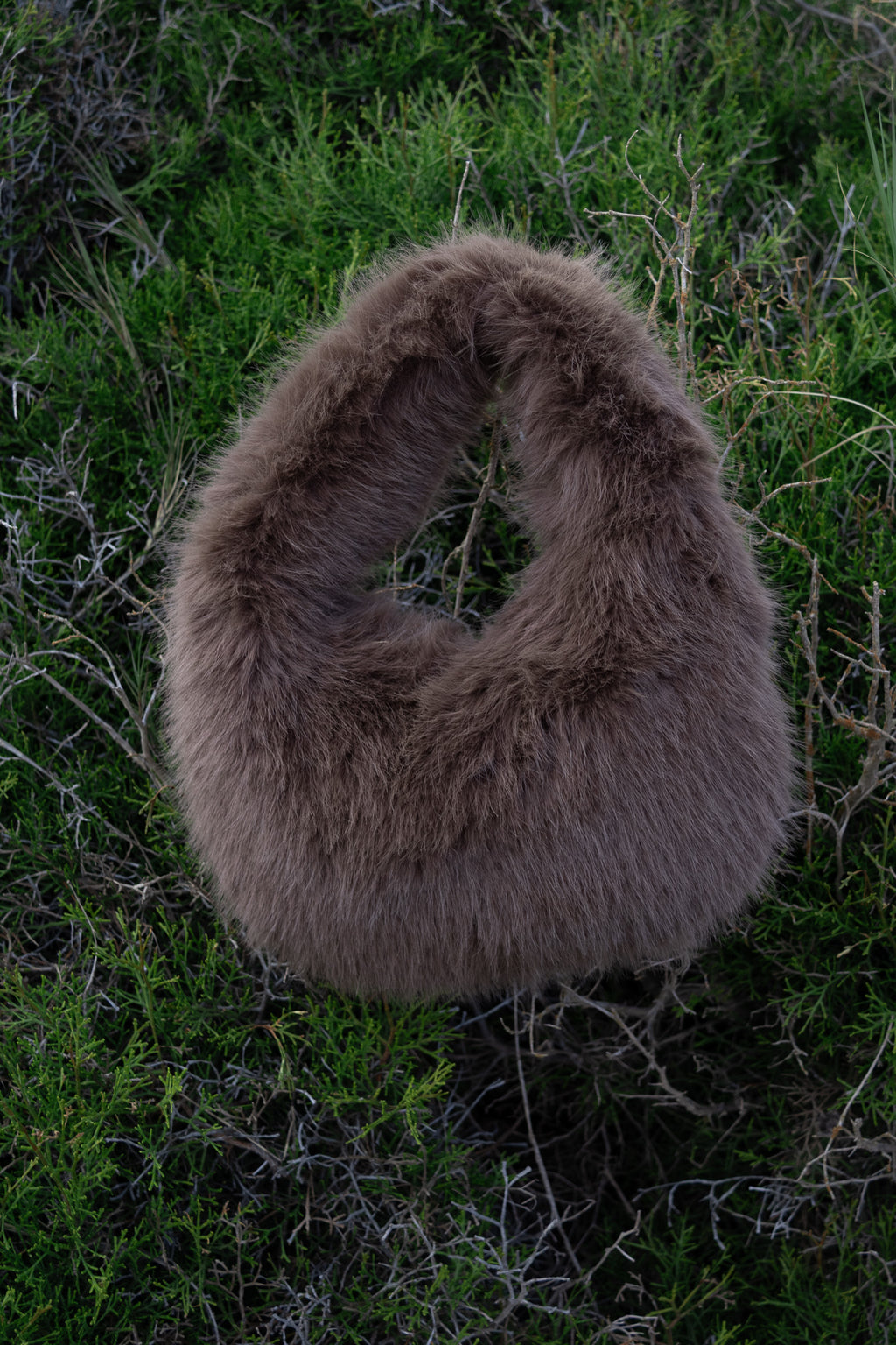 Women's handbag with faux fox fur design