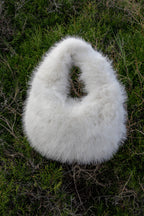 Women's handbag with faux fox fur design