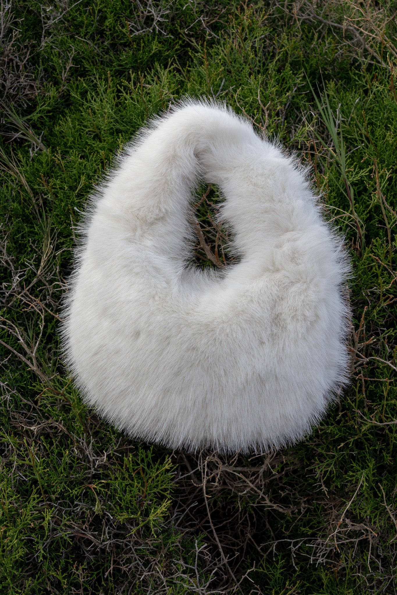Women's handbag with faux fox fur design