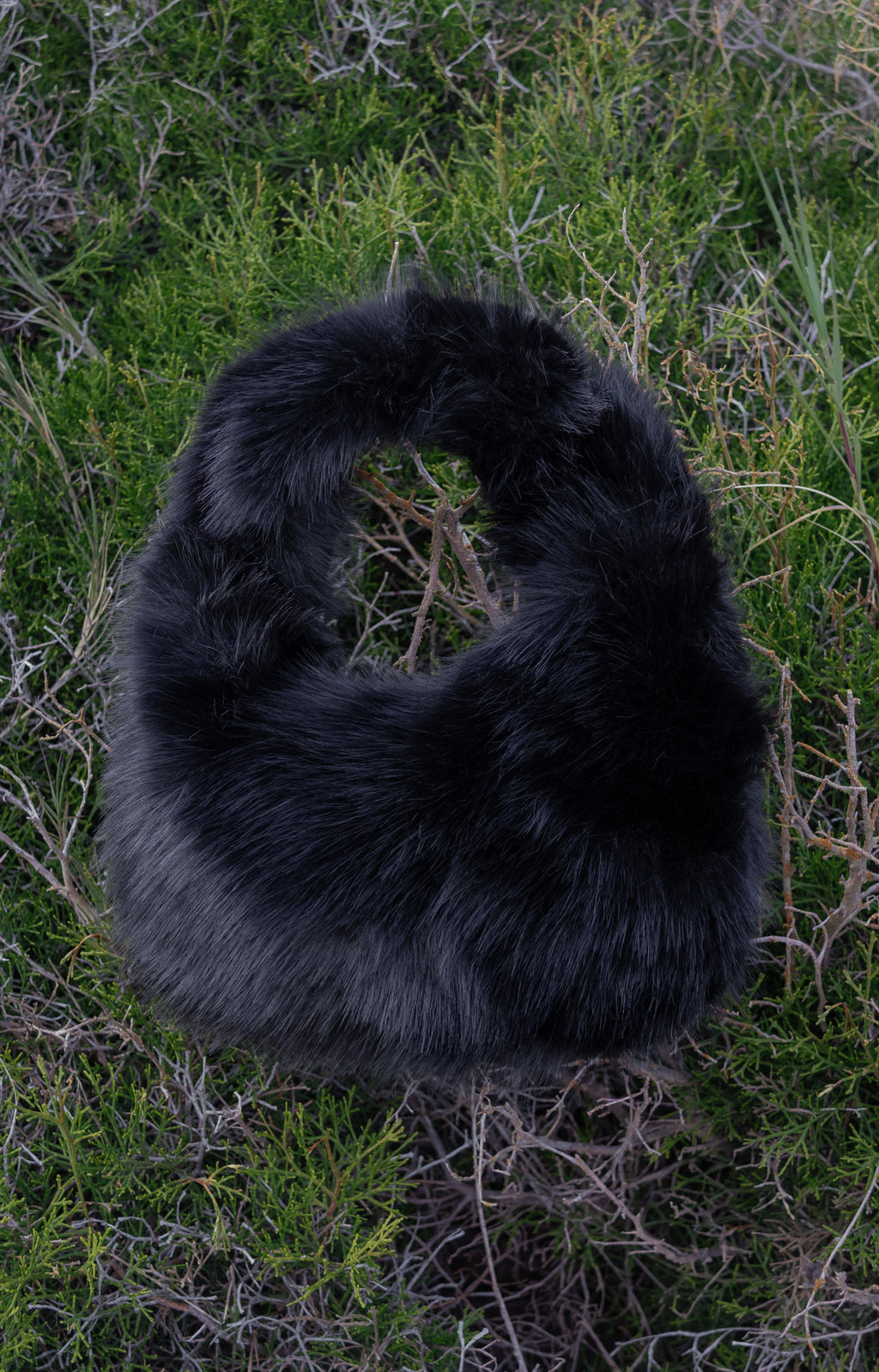 Women's handbag with faux fox fur design