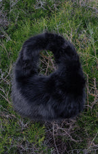 Women's handbag with faux fox fur design