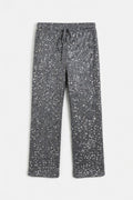 Pantalones largos holgados con cordones y lentejuelas