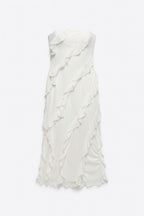 Vestido sin tirantes con dobladillo con volantes y malla