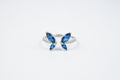 Anillo ajustable con mariposa de cristal azul